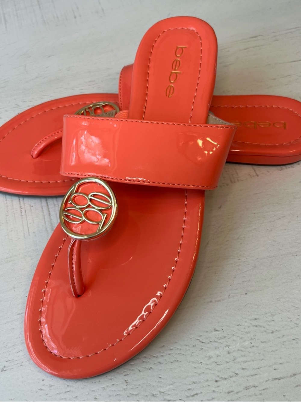 bebe Lawren Coral Patent Leather Sandals with Gold Medallion